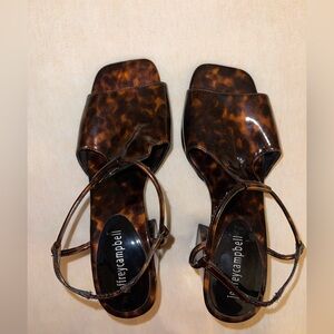 Jeffrey Campbell size 6 tortoise shell looking patent leather heeled sandals.